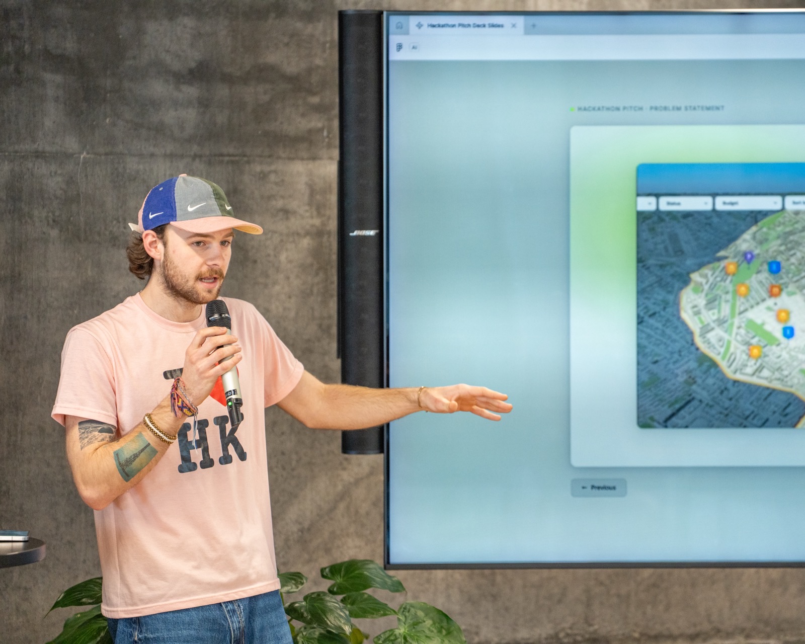 Presenting Klaudiush demo on stage at AEC Hackathon